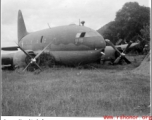 A C-46 hard on its belly in the CBI during WWII.  Photo from James Streitwieder.