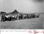 Chinese laborers pull a heavy roller on a runway at an American airbase at Guilin (Kweilin), China, during WWII.  From Paul Jones.