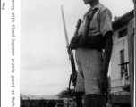 Armed Chinese guard at Wuchang Hospital during WWII.  Photo by Way.