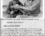 American and Chinese members of the CACW share a cigarette. Here Lt. Ralph E. Linhorst shares cigarette before they leave for mission.