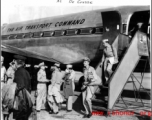 GIs depart a C-54 of the Air Transport Command (ATC) at Karachi during WWII. The 1306th Army Air Force Base Unit (306th AAFBU) provided services such as the stairs down from the plane.  The Photo from Al De Grasse.
