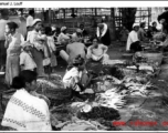 Open-air produce market in Burma, or India, during WWII.  Photo from Samuel J. Louff.