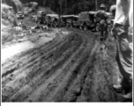 Truck convoy on the Ledo Road, mostly driven by members of the 172nd General Hospital Unit heading for Kunming, China, 1945.  Photo by Cpl. Douglas J. Davis.