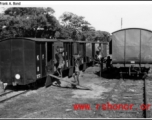 A train being loaded by hand in India during WWII.