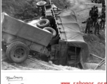 A truck of a Mars Task Force convoy crashed near Burma.  Photo from Henry Strong.