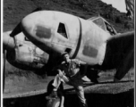 Rod Kelt poses with P-38 in Guangxi province, China, during WWII.