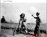 A cameraman shoots movie footages in the CBI during WWII.  Dale Flinders.