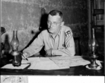 An American officer at his desk in the CBI during WWII.