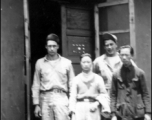 At the line mess hall, Yangkai 1944.  Frank Bates, Leo Lacher, Lee & his brother.  From the collection of Frank Bates.
