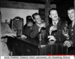 16th CCU personnel at a party having jolly time in Kunming city, Yunnan province, China, during WWII.
