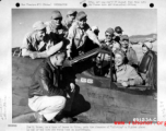 Joe E. Brown, touring bases in China, sits in a P-40 (serial #42-9768).  This is probably in Yunnan province, China.