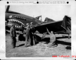 A P-40 under maintenance by American and Chinese crews in Kunming, China.