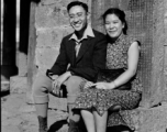 VIP Chinese couple pose at pavilion during a day outing in Songming county, during WWII.