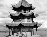 Western and Chinese friends chat at a pavilion in Songming county during WWII.