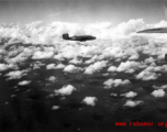 B-25 Mitchell bombers in flight and dropping bombs in the CBI, in the area of southern China, Indochina, or Burma.