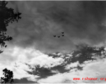 B-25 Mitchell bombers in flight in the CBI near an American air base, in the area of southern China, Indochina, or Burma. During WWII.