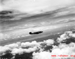 B-25 Mitchell bombers dropping bombs in flight in the CBI, in the area of southern China, Indochina, or Burma.