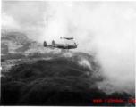 P-38s in flight in the CBI, in the area of southern China, Indochina, or Burma, during WWII.