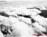 B-25 Mitchell bombers in flight in the CBI, in the area of southern China, Indochina, or Burma.