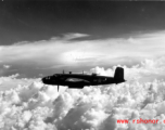 B-25 Mitchell bomber in flight in the CBI, in the area of southern China, Indochina, or Burma. During WWII.