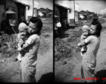 A woman holding an infant in Yunnan during WWII.