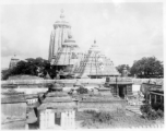 Enormous temple complex and architecture in India, at the large Jagannath Temple of Odisha complex (Hindu) in India.  Scenes in India witnessed by American GIs during WWII. For many Americans of that era, with their limited experience traveling, the everyday sights and sounds overseas were new, intriguing, and photo worthy.