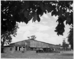 A covered theater area in India.  Scenes in India witnessed by American GIs during WWII. For many Americans of that era, with their limited experience traveling, the everyday sights and sounds overseas were new, intriguing, and photo worthy.